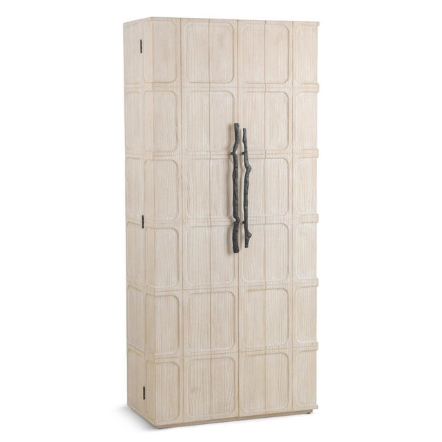 Crafted from whitewashed pine with a beautifully textured, hand-finished character, this tall storage cabinet pairs softly...