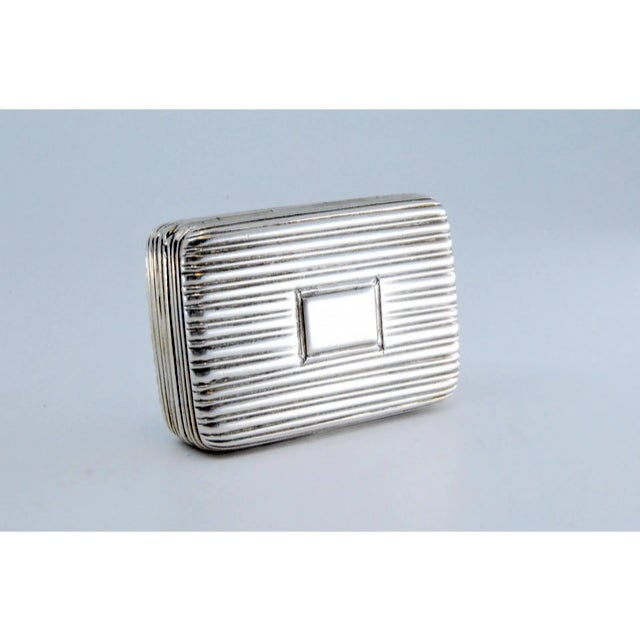 George V Fluted Silver and Gold Vinaigrette Box, in Very Good conditions. Designed before 1890 This piece has an...