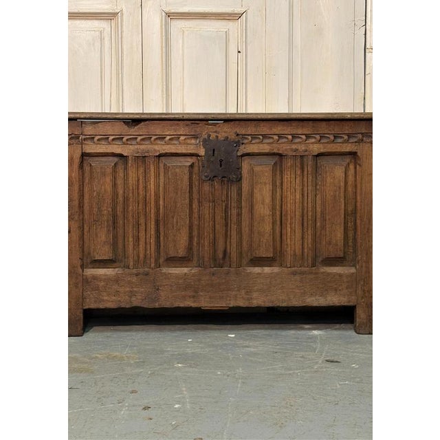 This 18th-century chestnut chest features a long, narrow shape that makes it particularly versatile. The intricate...