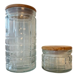 Two Glass Canisters Wood Tops For Sale
