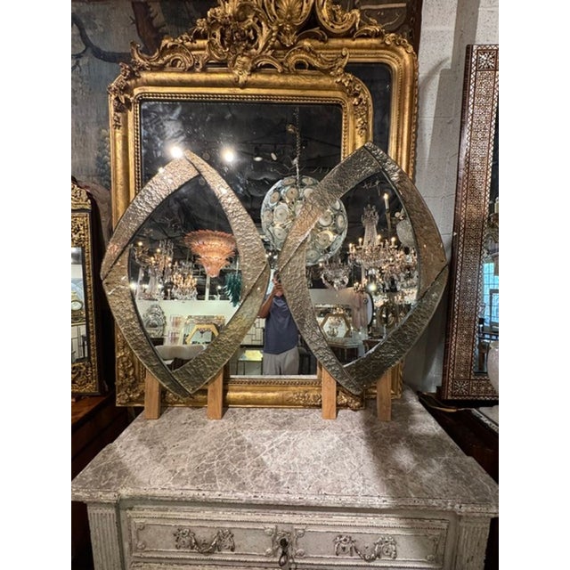The Pair of Murano Modernist Silver Mirrors are a sleek and elegant addition to any home décor. The modernist design adds...