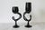 Set of two vintage hand blown black art glass goblets. No makers mark. Tall, 3.5"L x 3"D x 9.75"H Short, 4.25"L x 3.25"D x...