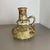 Article: Fat lava art vase. Producer: Ruscha, Germany. Decade: 1970s. This original vintage vase was produced in the 1970s...