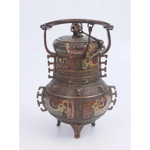 19th century?. China or Japan. Bronze, multi-colored enamel. Height 33 cm, width 17.5 cm, diameter 8.5 cm