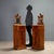 Pair of walnut nightstands dating back to the late 19th century, featuring a refined design and artisanal details. The top...