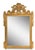 An impressive pair of reproduction gold gilt mirrors. The frames are very decorative with crests of floral baskets and...