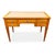 A 19th-century French Louis XVI-style centerpiece desk featuring three large drawers on the front, one with a secret...