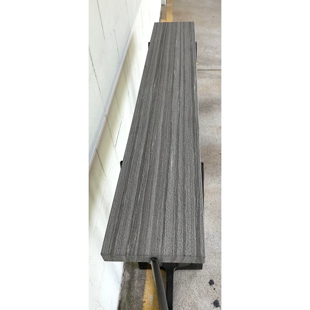 Original retail $2832, stylish Revelation Modern Gray Marble Tapering Console Table, gunmetal finished steel base, sand...