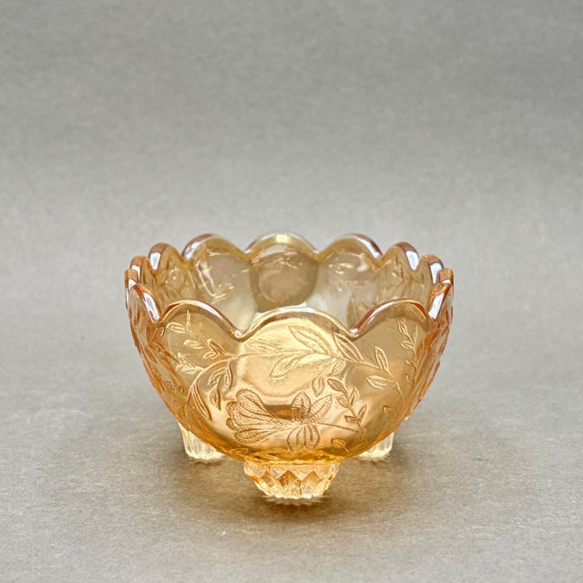 This stunning vintage Jeannette Glass candy dish features the classic "Floragold Louisa" embossed pattern, showcasing...