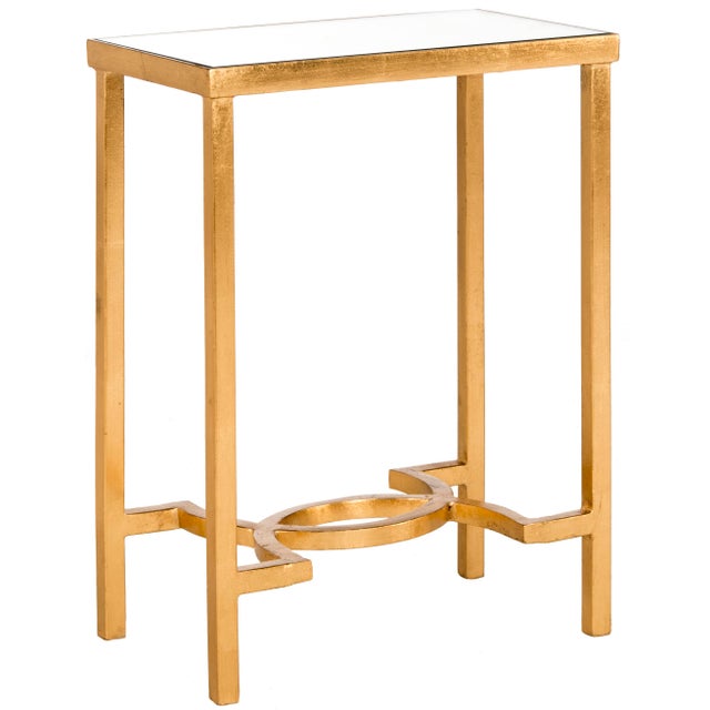 The shimmering antique gold leaf finish that adorns this classic end table makes it a designer favorite. it's softly...