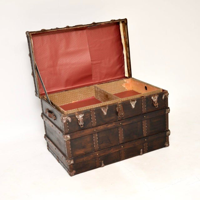 A wonderful large antique pine travel trunk / storage chest, made in England and dating from around the 1900-1910 period....