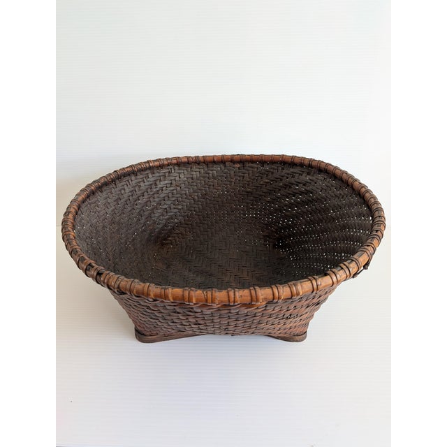 I'm an award winning basket maker who has been collecting baskets for decades and am parting with many of them. This 1960s...