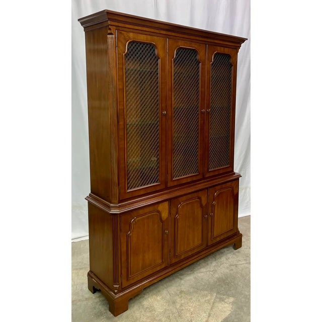 Vintage American Classical China Cabinet by Henredon Fine Furniture featuring Sturdy Walnut Construction, Three Panel...