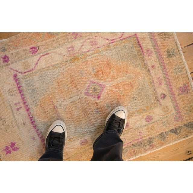 :: Simplistic concentric diamond shaped enter medallions with stemmed minor blossoms outwardly directed atop a stepped...