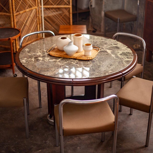 Round Dinner Table in mahogany and green marble with a wood and chrome base. Manufactured in France in the 70´s. In very...