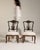 A decorative pair of Victorian chairs showcasing detailed carving and classic proportions. Victorian furniture often...