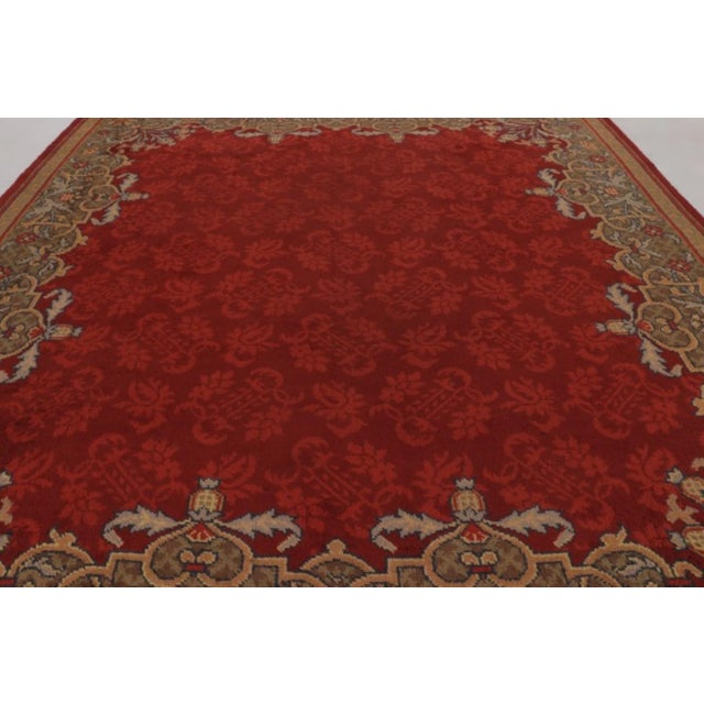 Made with hand-knotted wool and originating from the Netherlands circa 1920-1930, this 12x13 antique Art Deco rug is one...