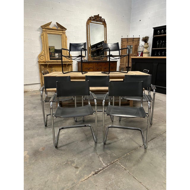 These chairs from the 1980s are in very good overall condition. The leather has a nice patina from wear. Seat height: 45...
