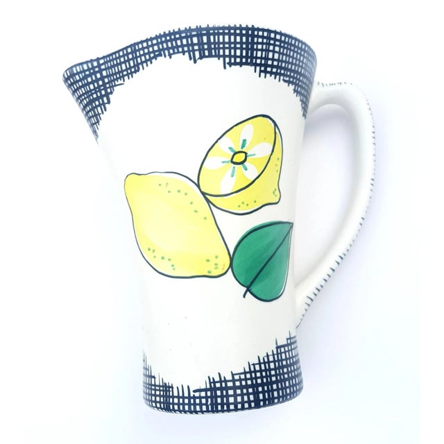 Flower decor in Art Deco \. Heller ceramic shards, black-brown shiny glaze with oval, floral medallions on four sides \.