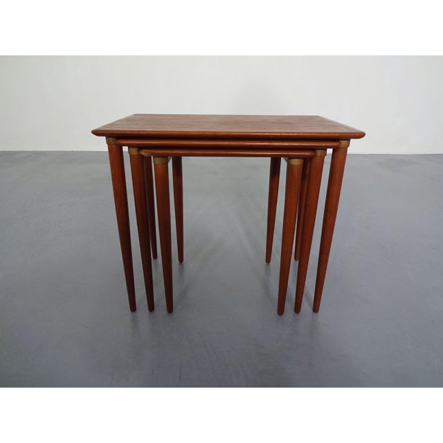 Set of 3 Danish teak tables from the 1960s.