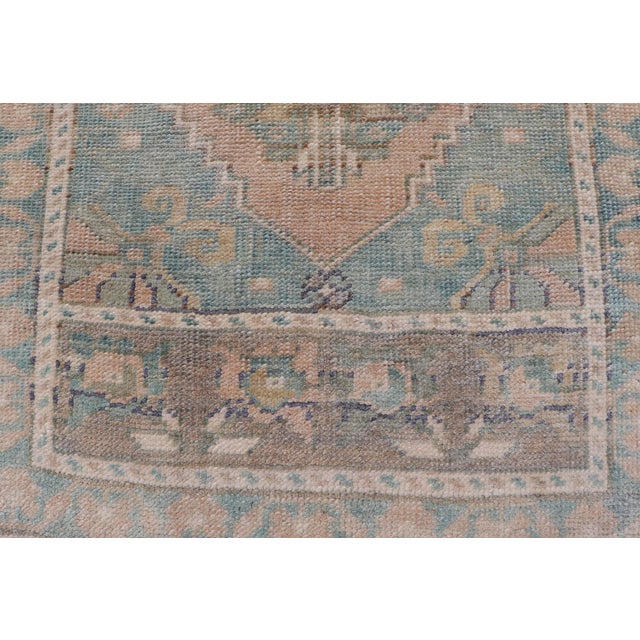 Textile Vintage Turkish Oushak Rug With Soft Peach Field and Pale Aqua Accents For Sale - Image 7 of 8