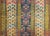 A wonderful early 20th century Persian Kurdish runner with a narrow stylized floral pattern in the center, and surrounded...