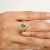 Pear Emerald Double Halo Diamond Engagement Ring for Her in 14K Gold featuring natural emerald of 0.74 carats and diamonds...