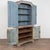 Early 19th century Swedish wedding cabinet, crafted in pine and built in two sections. The upper cabinet opens to reveal...