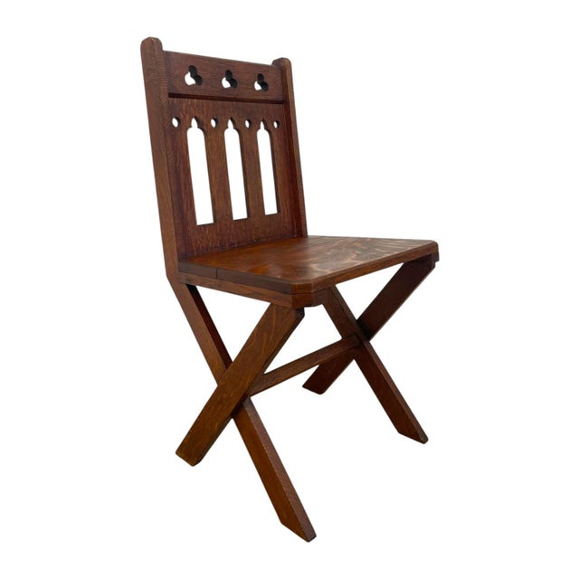 This antique accent chair features a heavily figured quartersawn tiger oak construction highlighted by prominent, rich...