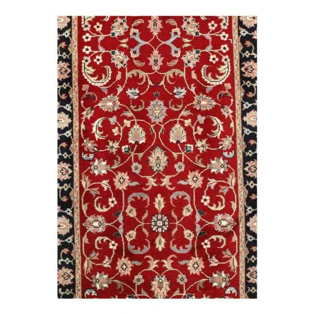 Hand-knotted by weavers in a workshop in northern India using blended local with worsted New Zealand wool. The detailed...