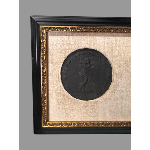 2 Antique Victorian Wedgwood Basalt Plaques with Flute Playing Cherub & Angel In very good condition showing some typical...