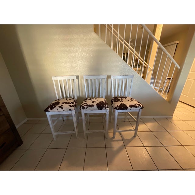 Wood Rustic Farmhouse Whitewash Bar Stools W/ Cowhide Upholstered Seats Set of 3 For Sale - Image 7 of 12