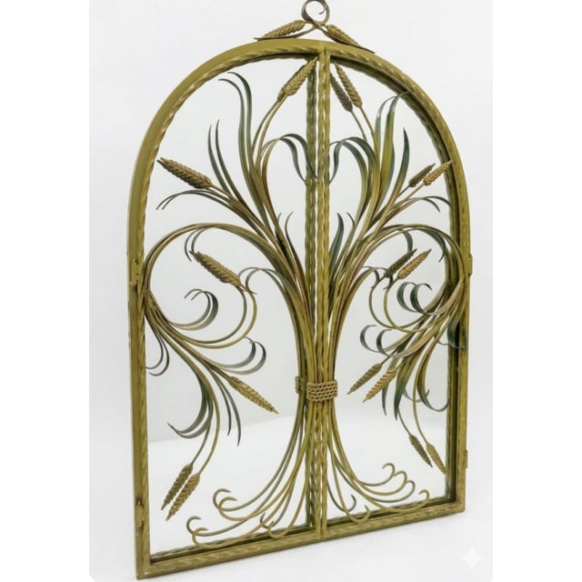 A beautiful, heavy very special vintage iron sheaf of wheat tole wall mirror. The mirror Features metal sheaf of wheat or...