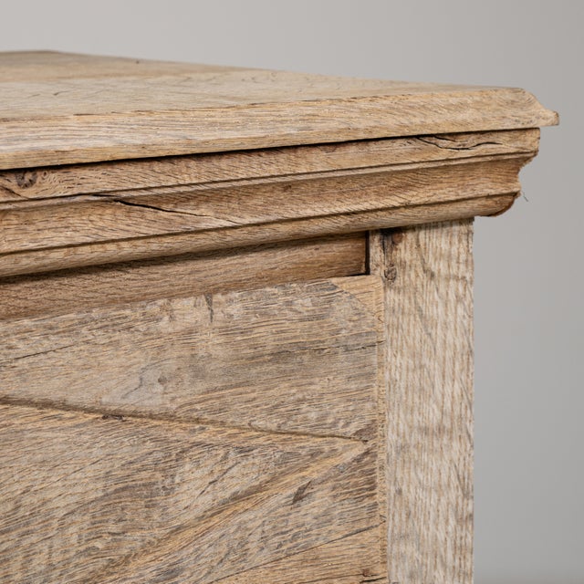Crafted in France during the 19th century, this stately oak buffet embodies the robust yet refined sensibility of...