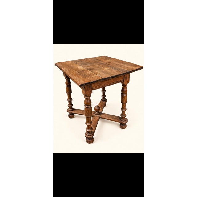 A magnificent small louis xiii style side table, likely made of solid oak, showcasing the craftsmanship typical of early...