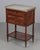 A 19th century French Louis XVI style marble top nightstand, or side table, made of veneers of mahogany with solid oak as...