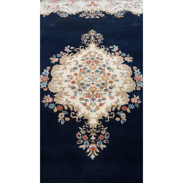 Offered is this large vintage Kirman rug/ carpet with mainly dark blue and pink colors and beautiful patterns 328x238cm....