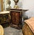 Elevate your interior with this stunning French-style marquetry cabinet, masterfully crafted with intricate floral inlay...