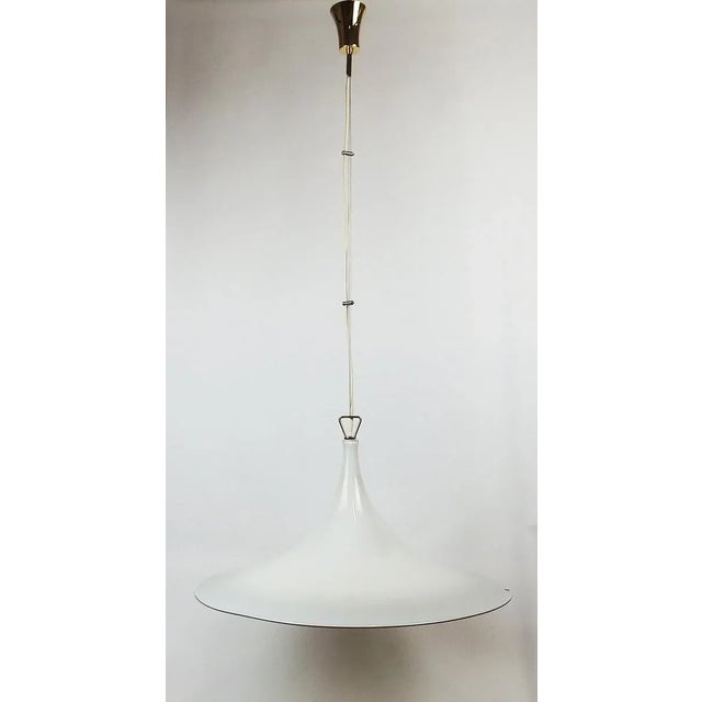 Magnificent suspended opalescent glass passing a gradation of green to white by the glass master Lino Tagliapietra....