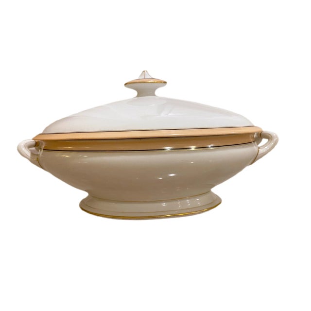 This gorgeous handled server is so simple and so elegant. With peach accents, navy and gold. The handles are almost like...