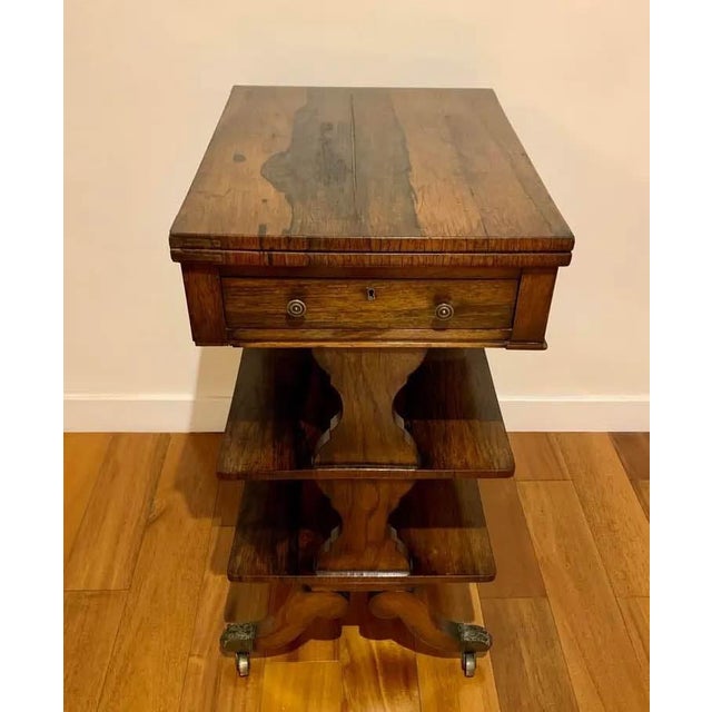 Gorgeous 19th c table with monogrammed pull out . Stunning wood and condition I.top folds out to game or desk top...