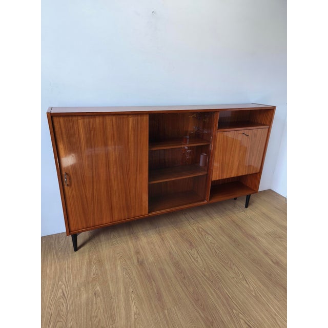 1970s modernist sideboard. Simple and minimalist. Original condition. Some scratches, discolourations, and paint chips may...