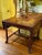 We found this antique French chinoiserie deep red writing table/ desk with its folding sides in Paris and fell in love...