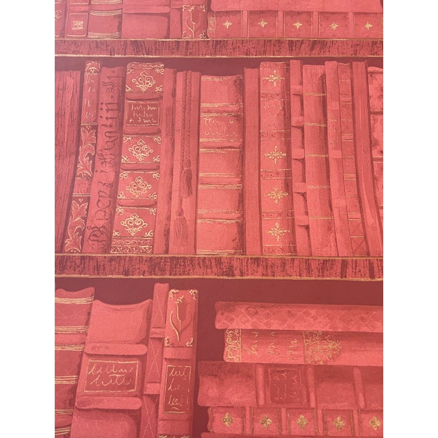 Beautiful faux bookcase wallpaper design in reds with gold accents 1 double Euro roll