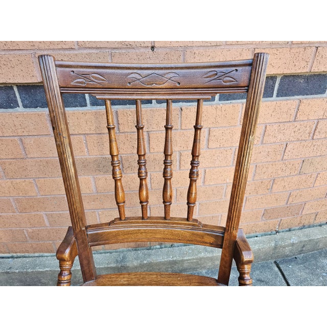 An exceptional Pair of Victorian Walnut Carved and Spindle Cane Seat Side Chairs in great condition. Measures 17" in...