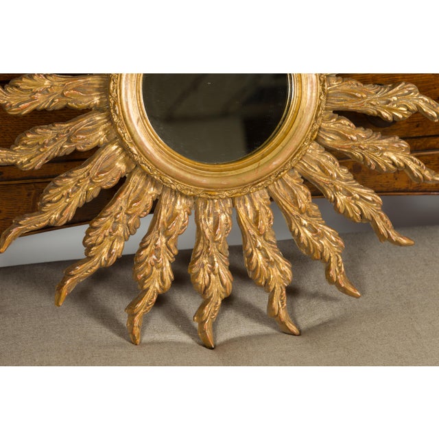 Wood French Giltwood Sunburst Mirror with Wavy Sunrays from the Mid-20th Century For Sale - Image 7 of 11