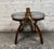 This vintage camel saddle footstool is read to bring an old world feel to any home. Made with a solid construction it...