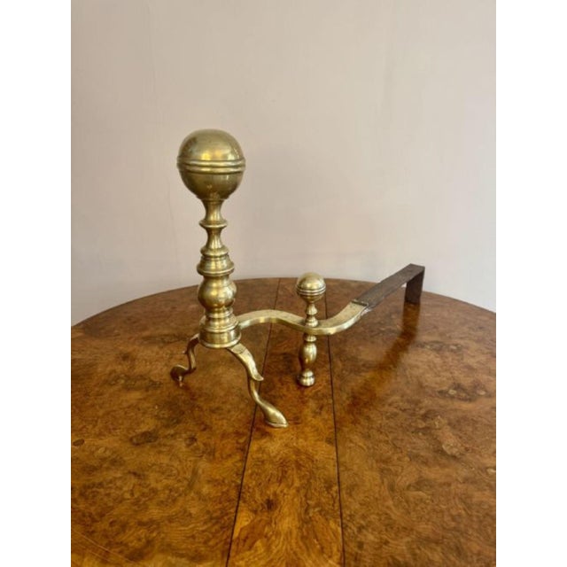 Fantastic large pair of quality 19th century brass fire dogs, having a quality pair of 19th century fire dogs with a large...
