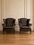 Pair of Mid-Century European Chesterfield-Style Tufted Leather Lounge Chairs, circa 1960s Description: A striking pair of...