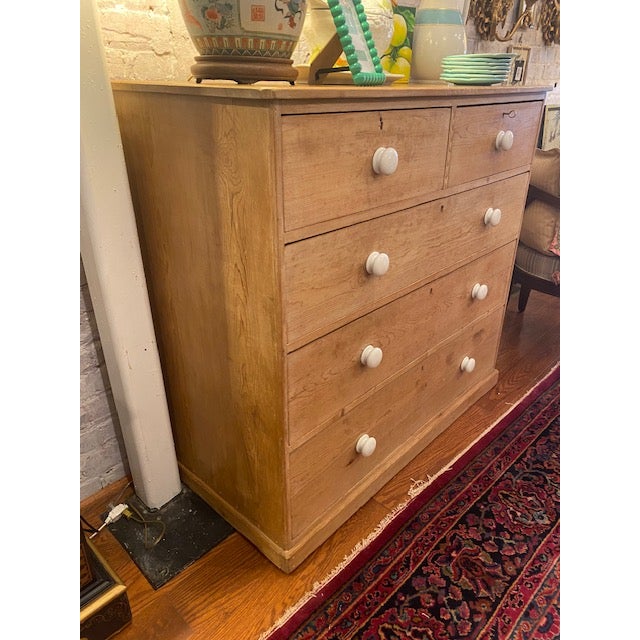 A charming early French pine dresser with authentic character and timeless appeal. This substantial piece features warm,...